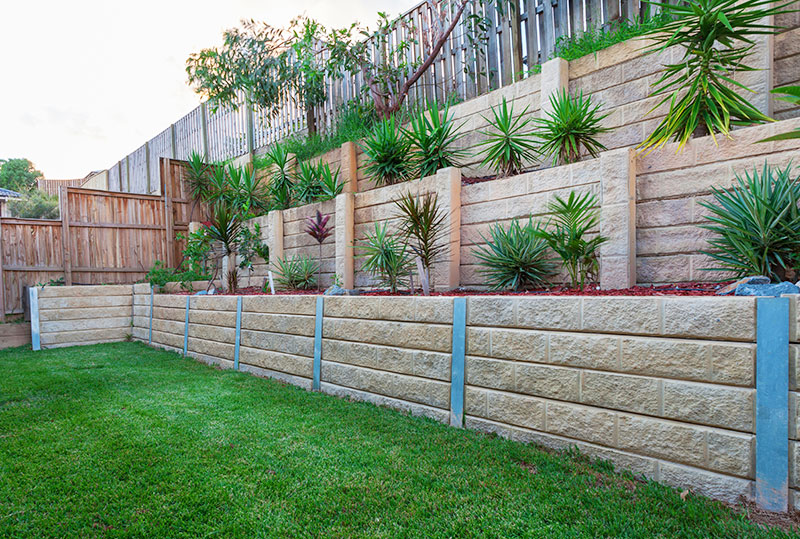 Stone Retaining Wall In Ballarat Backyard Sandstone With Yukkas